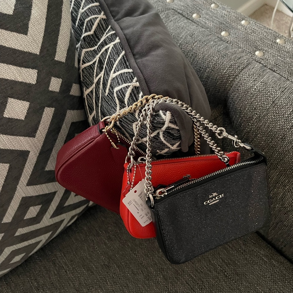 Coach Nolita Set of 2 - red and black. Burgundy sold. $75 for two.